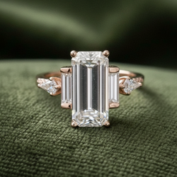 Ring on dark olive green velvet background