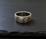 The Chemist Ring on Black Slate