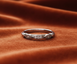 Twisted diamond band on rust orange velvet
