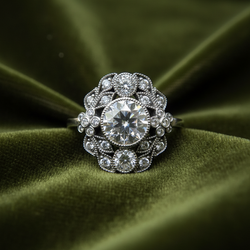 Vintage-style ring on dark olive green velvet